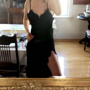 Black lace Fame and partners dress